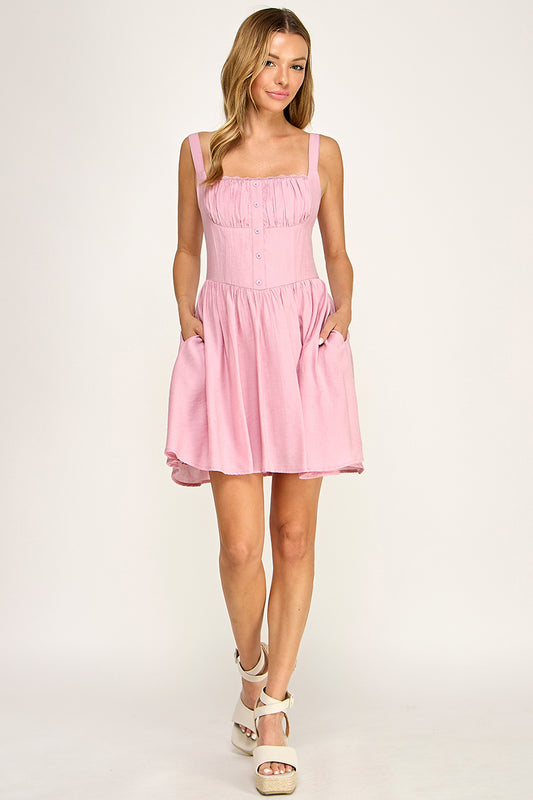 Woman wearing a dress on a white background