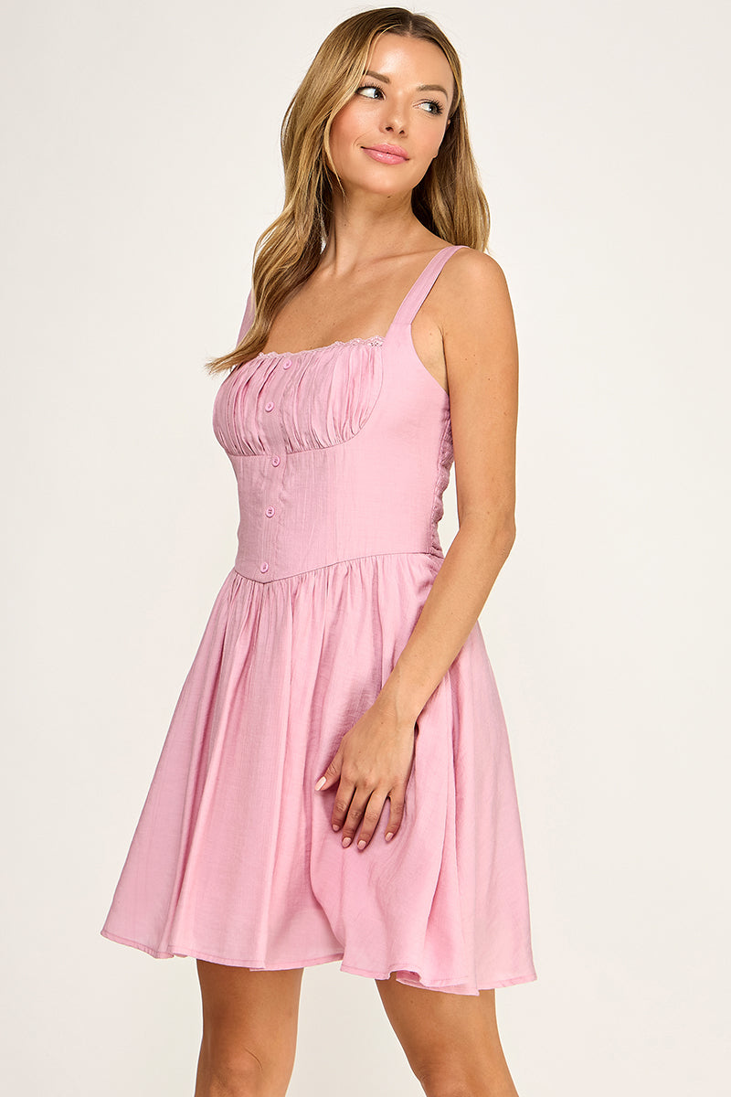 Woman wearing a dress on a white background