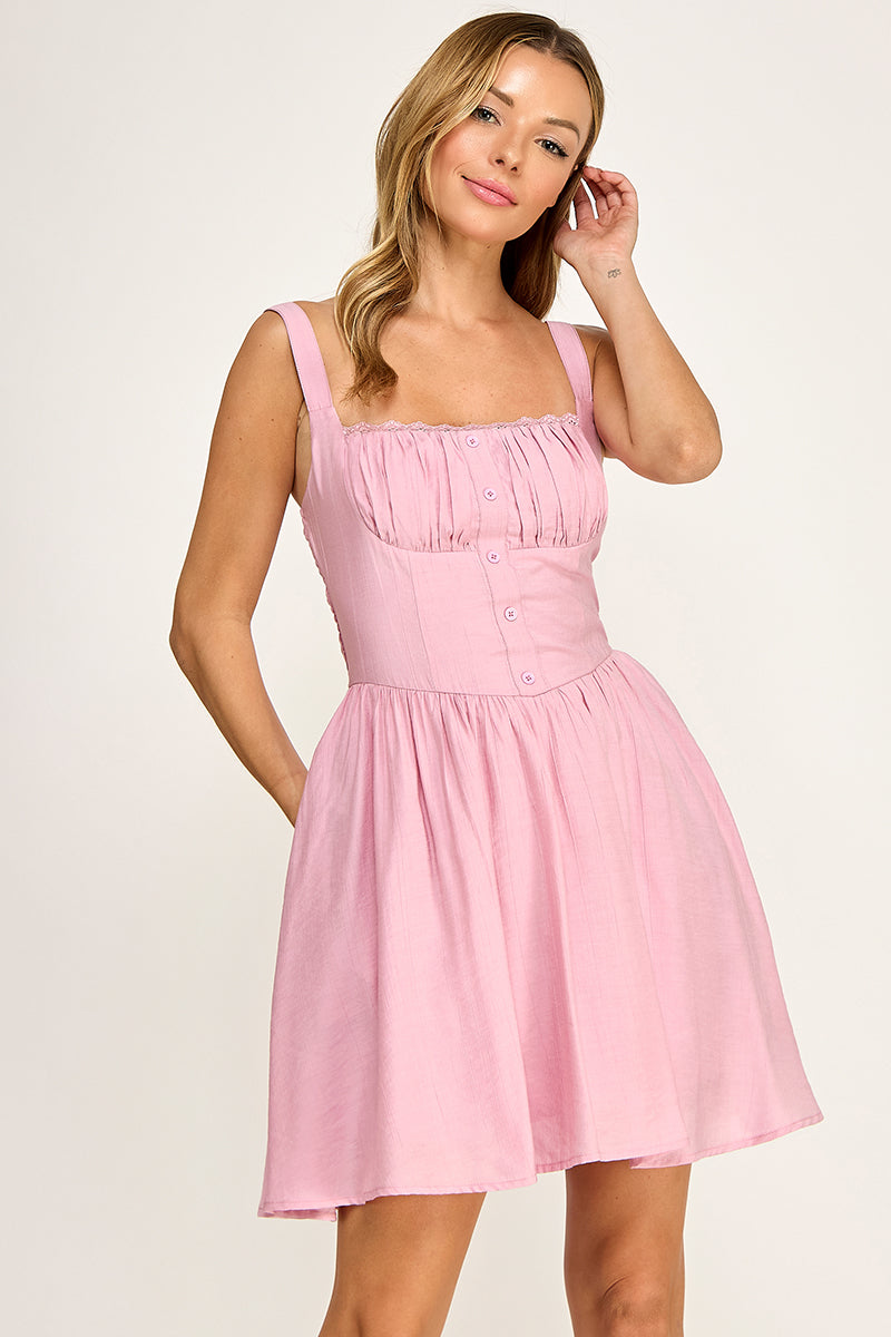 Woman wearing a dress on a white background