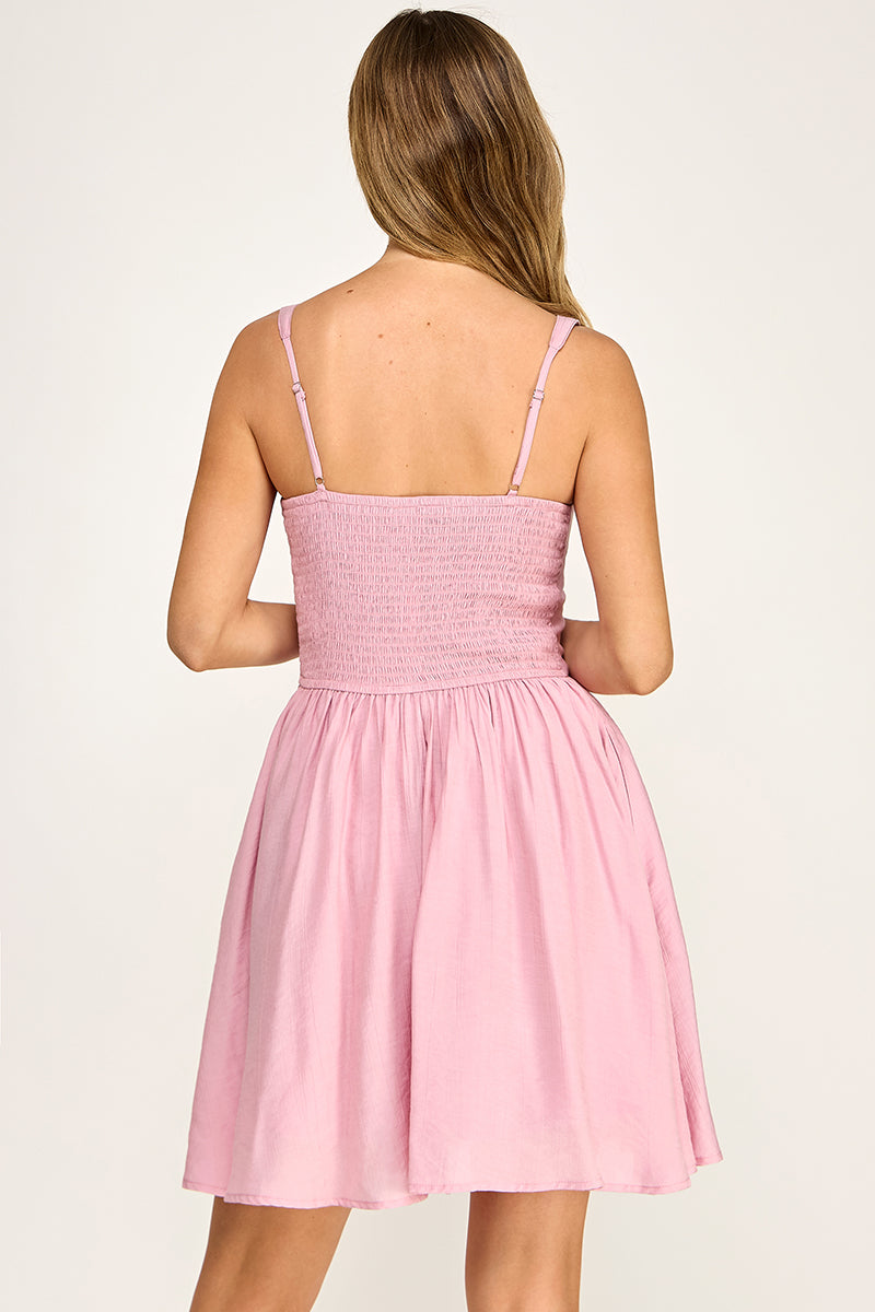 Woman wearing a dress on a white background