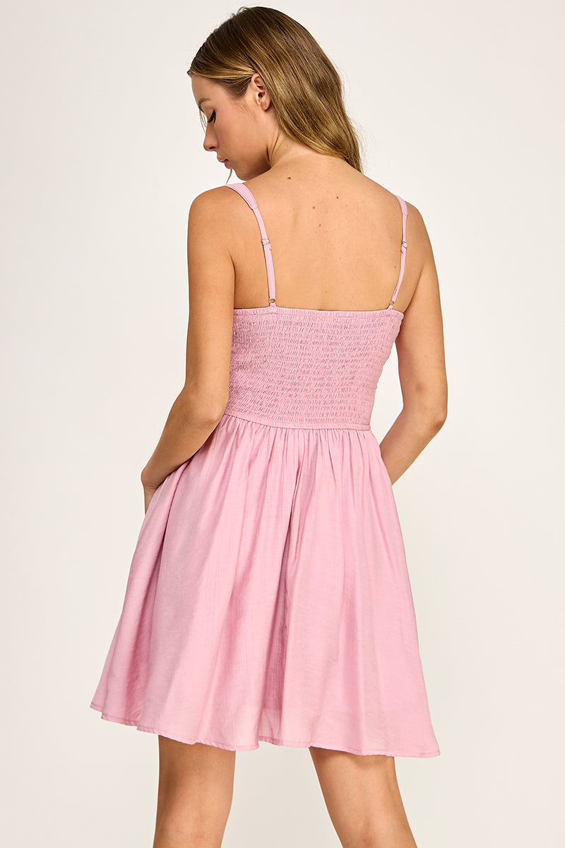 Woman wearing a dress on a white background