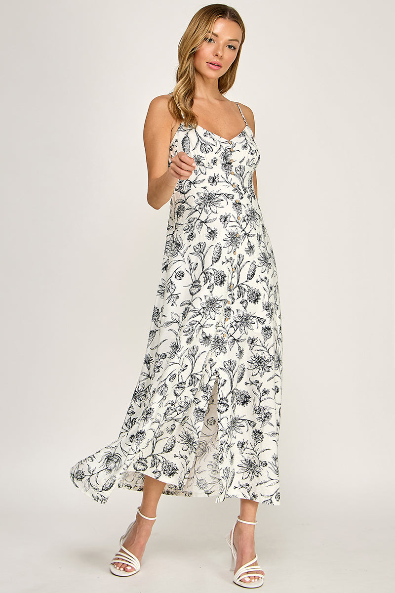 Woman wearing a floral dress on a white background