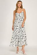 Woman wearing a floral dress on a white background