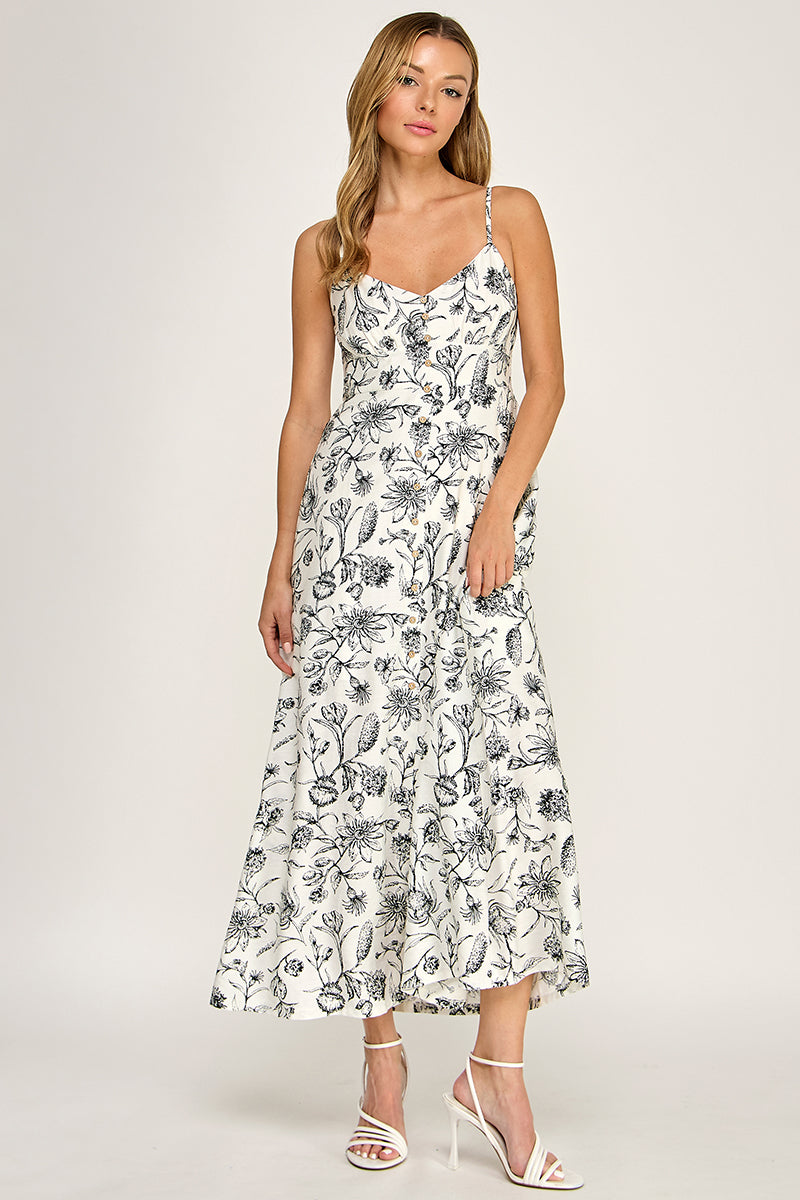 Woman wearing a floral dress on a white background
