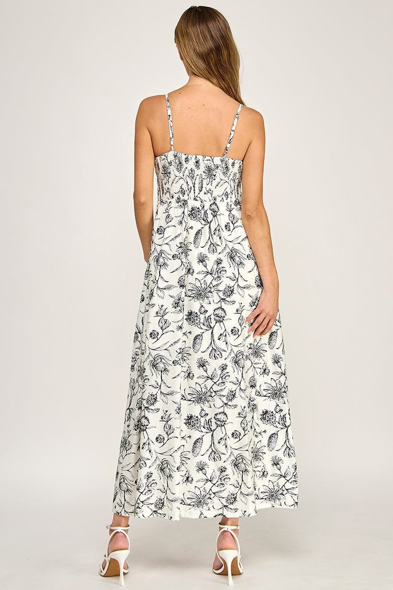 Woman wearing a floral dress on a white background