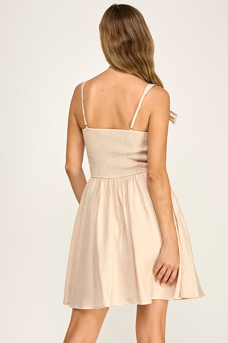 Woman wearing a dress on a white background