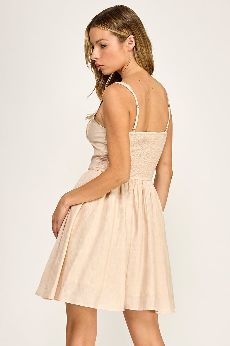 Woman wearing a dress on a white background