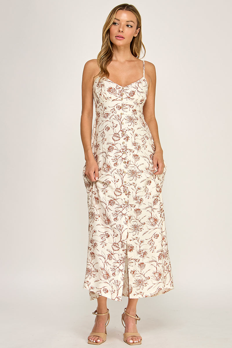Woman wearing a floral dress on a white background