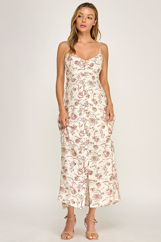 Woman wearing a floral dress on a white background