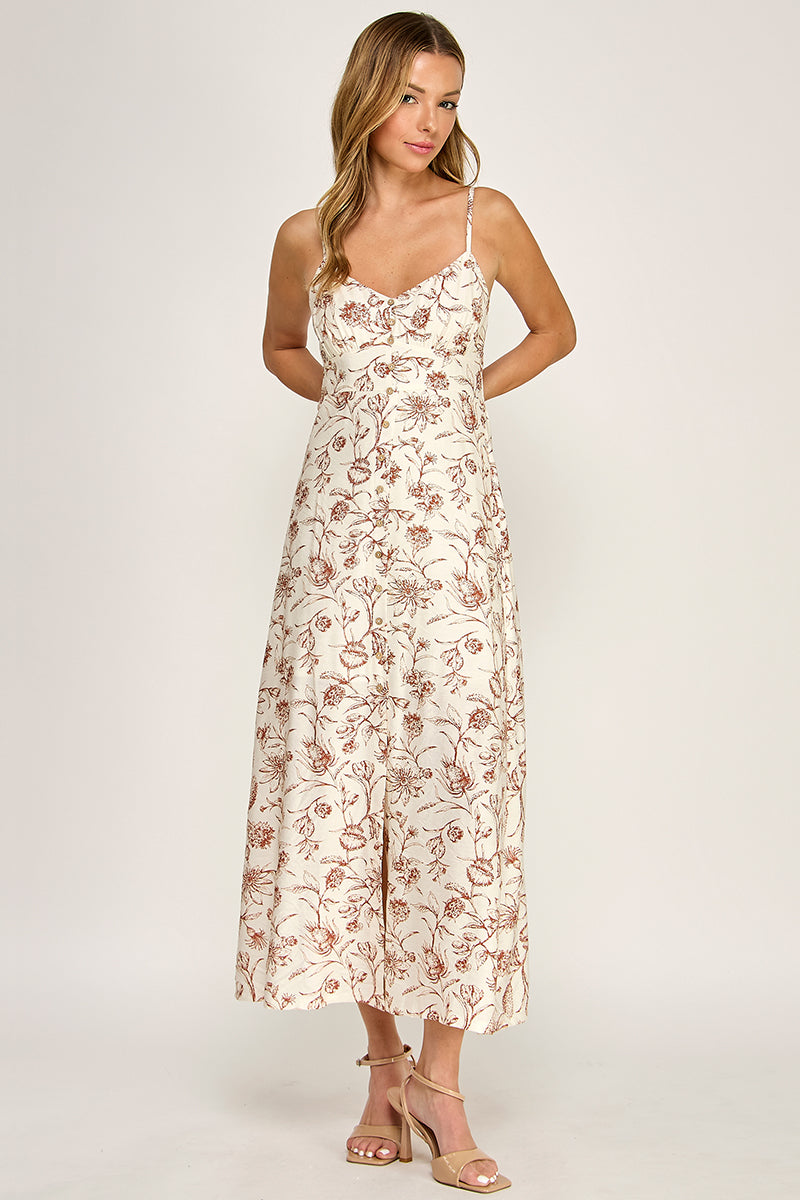 Woman wearing a floral dress on a white background