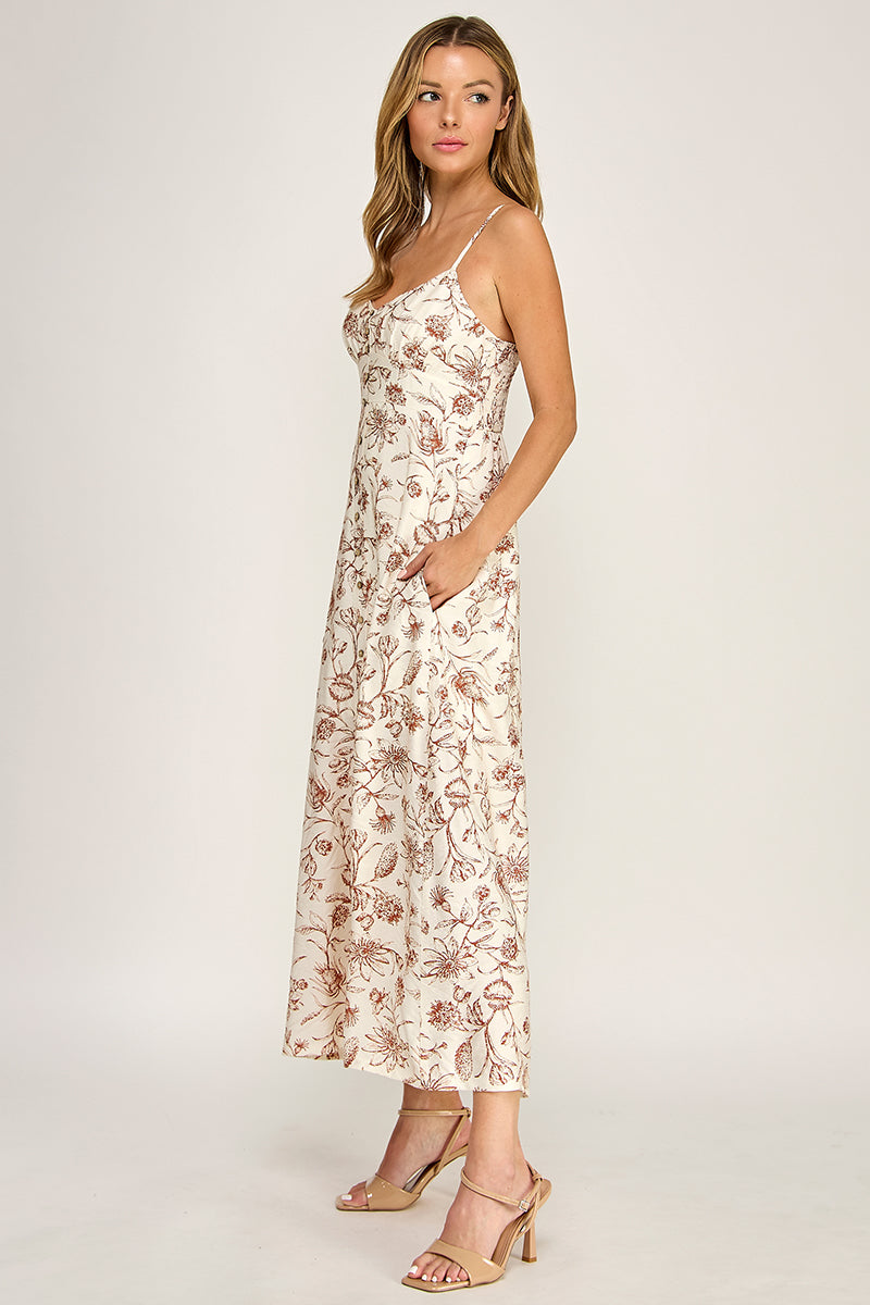 Woman wearing a floral dress on a white background