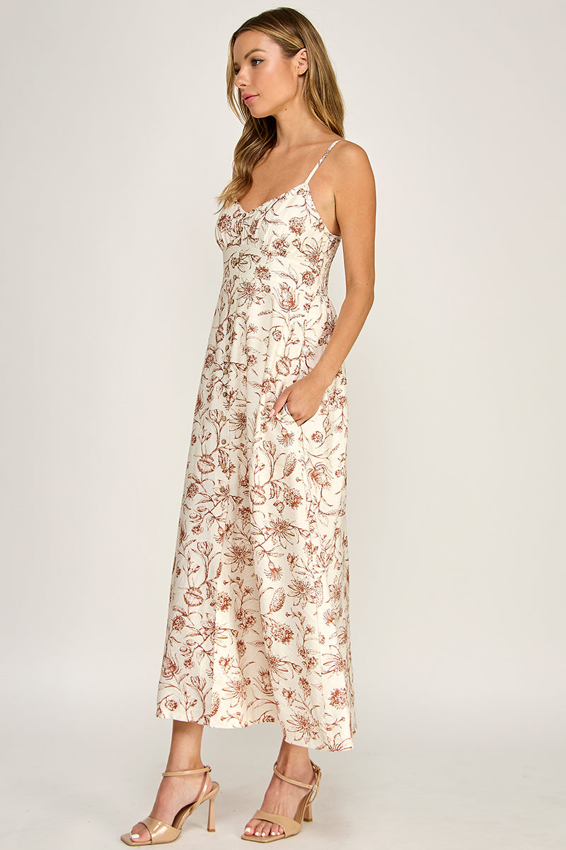 Woman wearing a floral dress on a white background