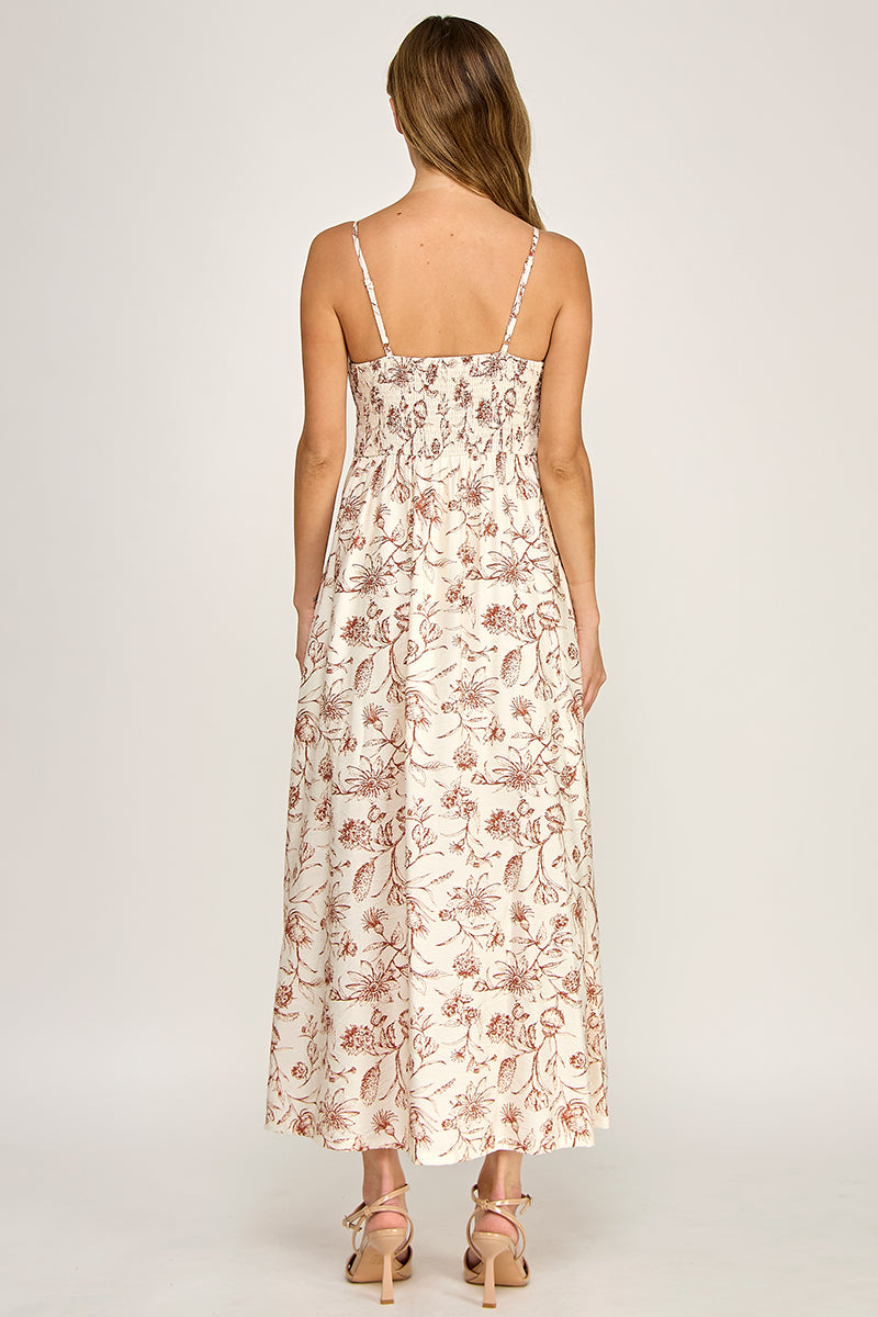 Woman wearing a floral dress on a white background