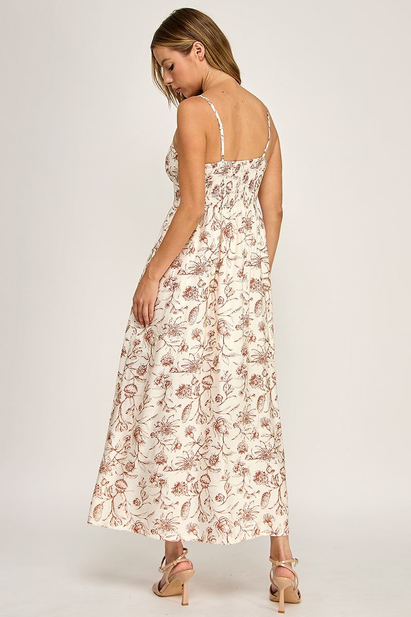 Woman wearing a floral dress on a white background