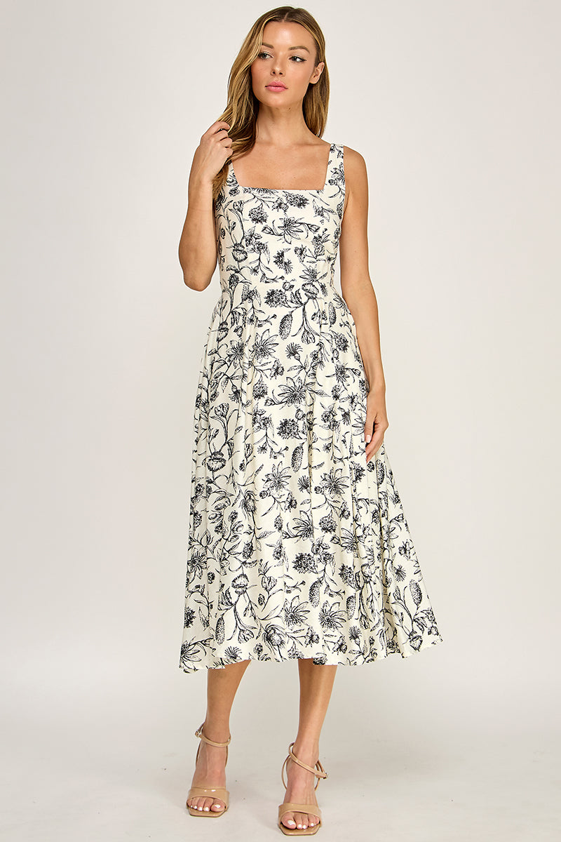 Woman wearing a floral dress on a white background