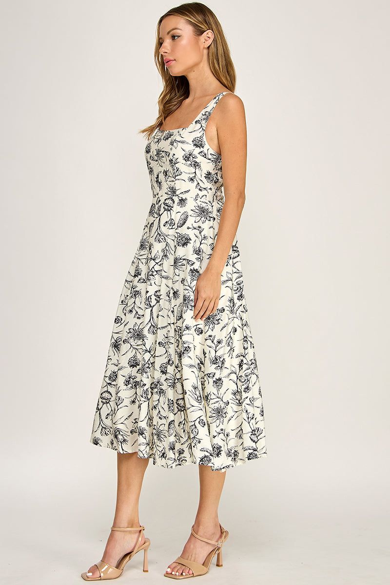 Woman wearing a floral dress on a white background