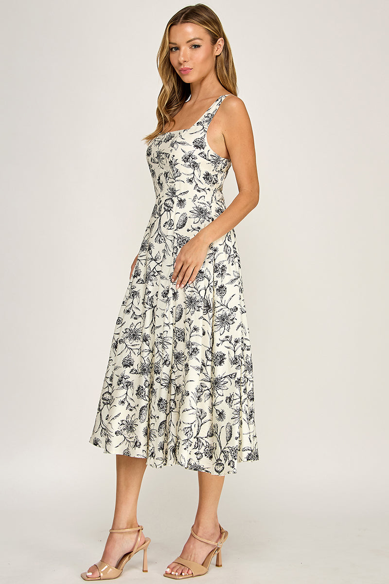 Woman wearing a floral dress on a white background