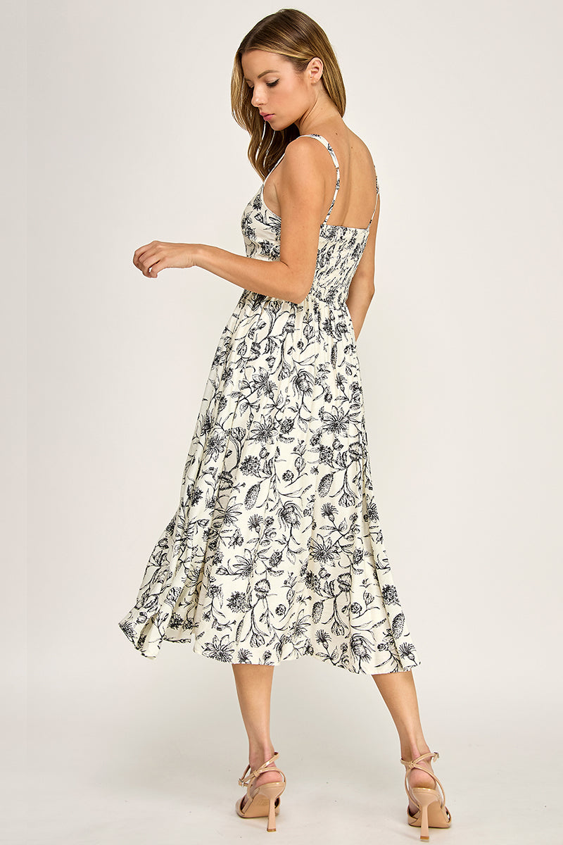 Woman wearing a floral dress on a white background