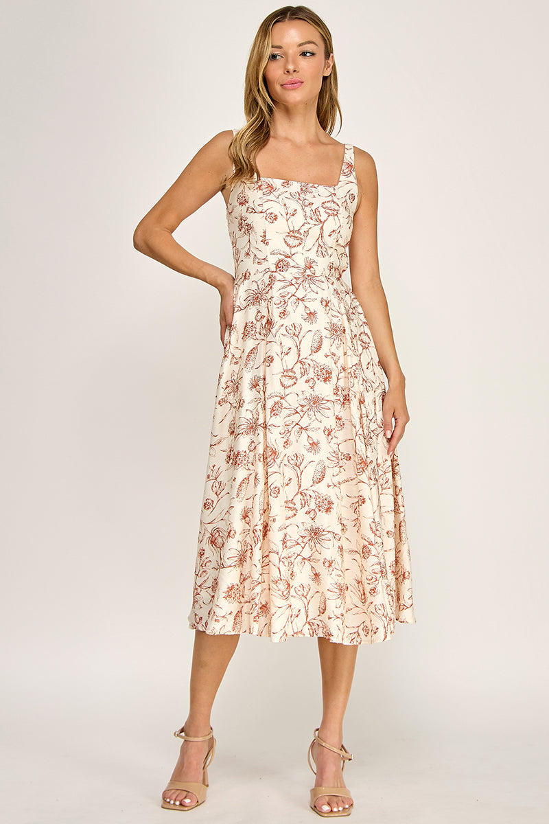 Woman wearing a floral dress on a white background