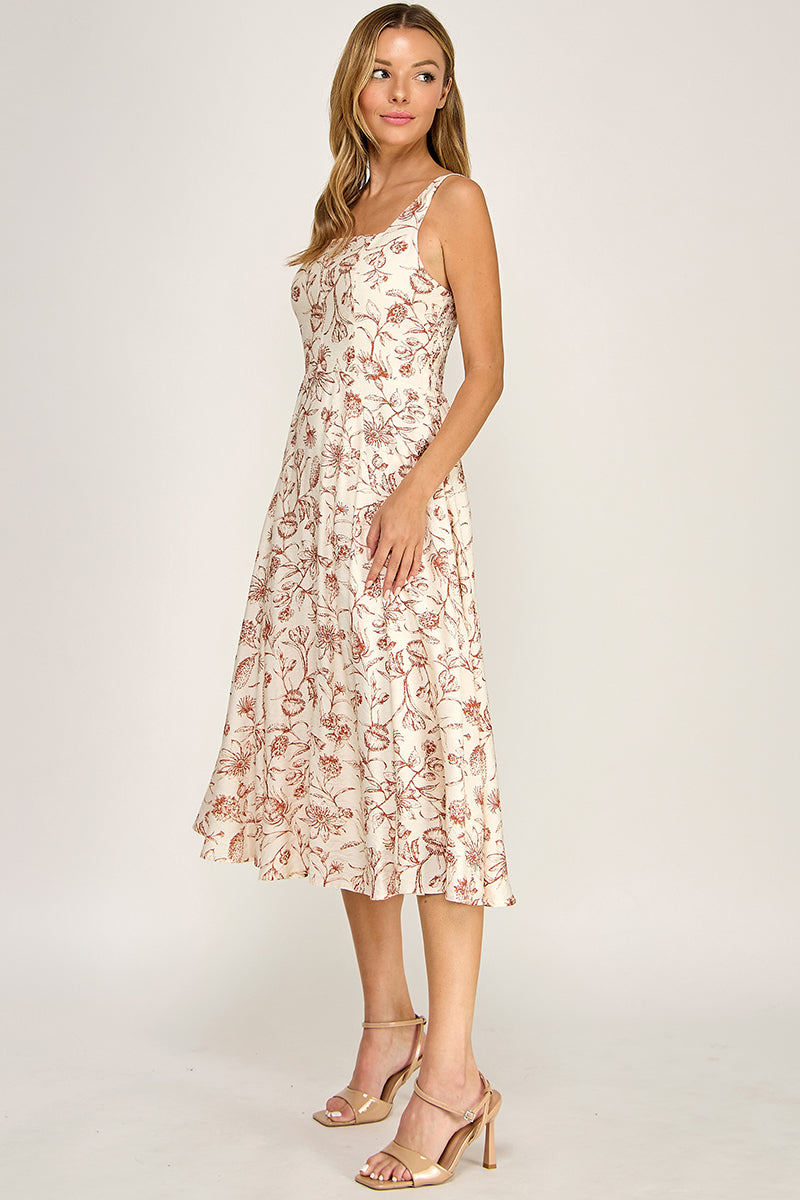 Woman wearing a floral dress on a white background