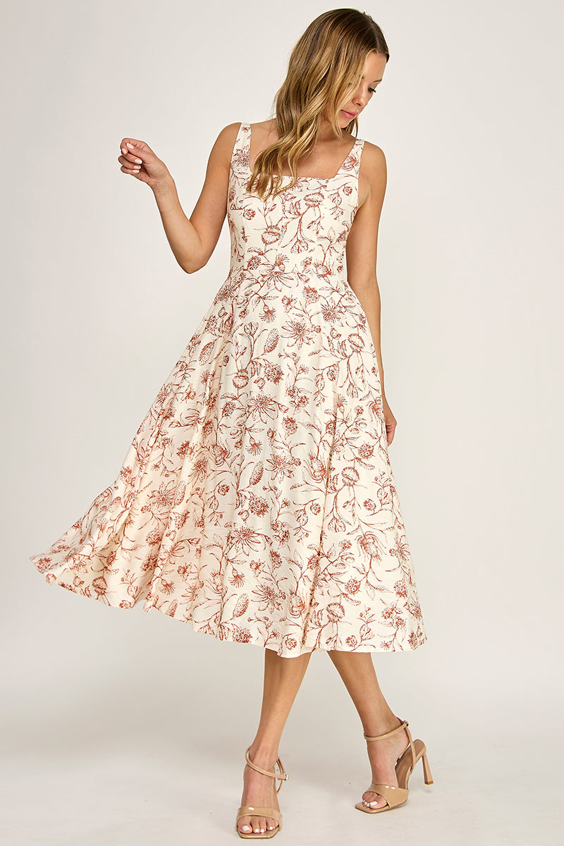 Woman wearing a floral dress on a white background