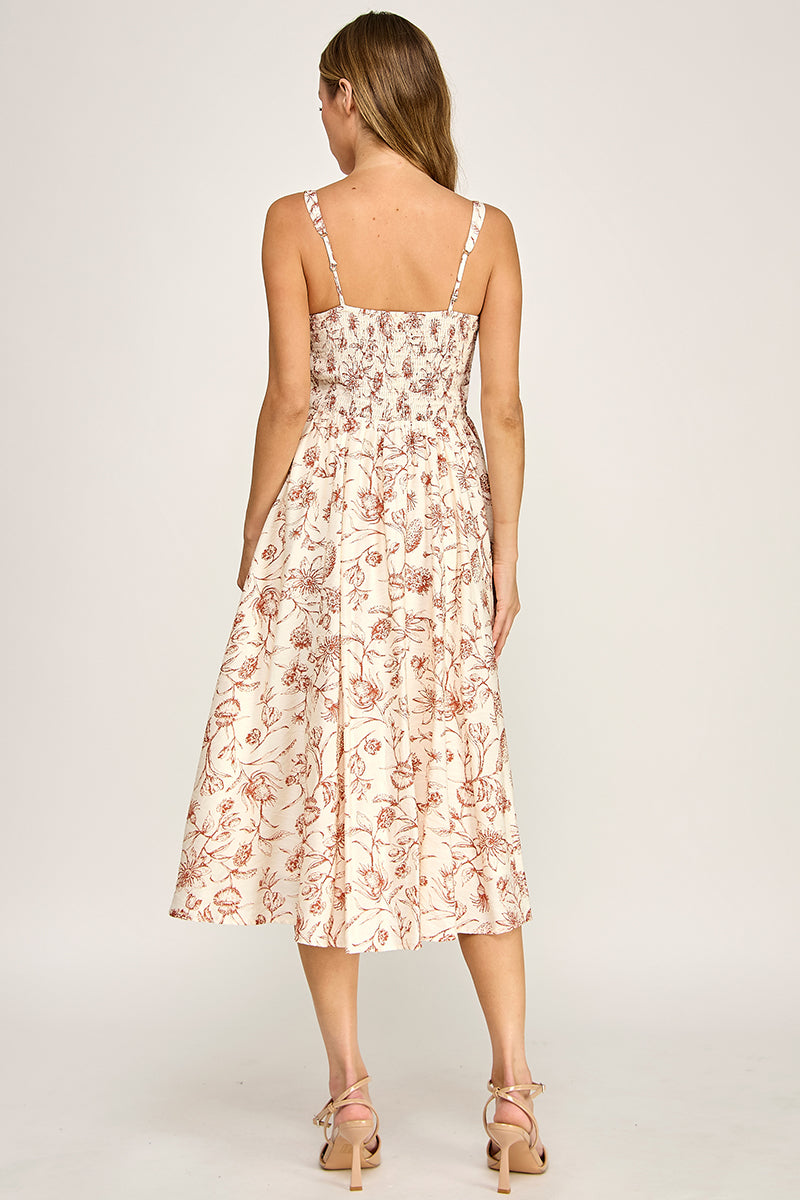 Woman wearing a floral dress on a white background
