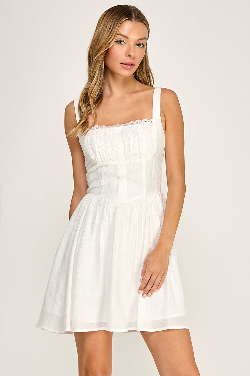Woman wearing a dress on a white background