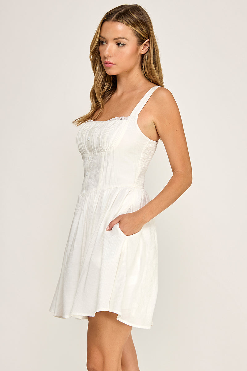 Woman wearing a dress on a white background