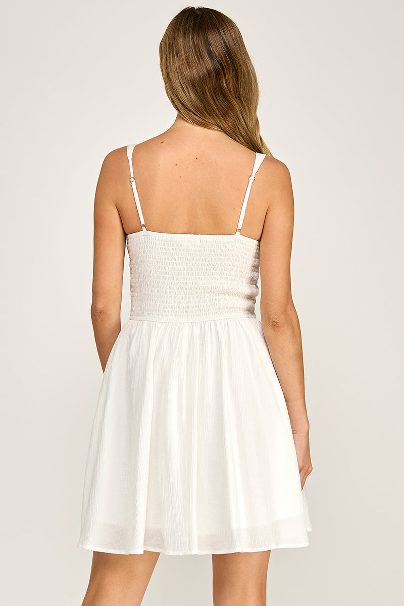 Woman wearing a dress on a white background